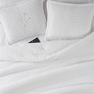 UGG&reg; Avery 3-Piece Reversible King Comforter Set in Snow Rivet. View a larger version of this product image.