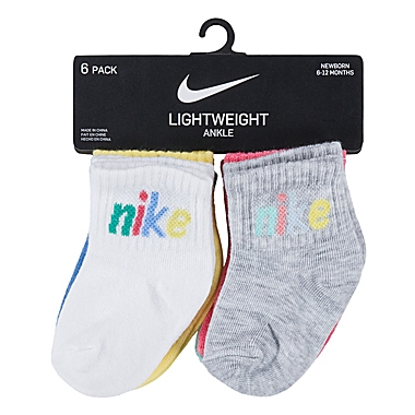 Nike&reg; 6-Pack Swoosh Logo Multicolored Ankle Socks. View a larger version of this product image.
