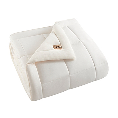UGG&reg; Corey Reversible Throw Blanket in Snow. View a larger version of this product image.