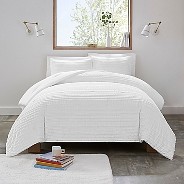 UGG&reg; Devon 3-Piece Full/Queen Reversible Comforter Set in White Clipped Stripe. View a larger version of this product image.