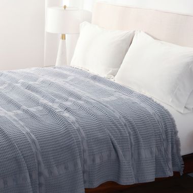 Bee &amp; Willow&trade; Washed Waffle Cotton Twin Blanket in Grey. View a larger version of this product image.