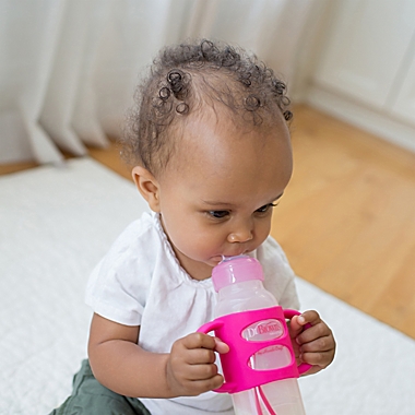 Dr. Brown&#39;s&reg; 8 fl. oz. Narrow Sippy Bottle with Silicone Handles in Pink. View a larger version of this product image.