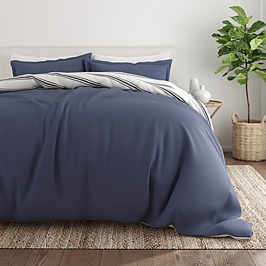 Home Collection Desert Stripe 3-Piece Reversible Full/Queen Duvet Cover Set in Navy. View a larger version of this product image.