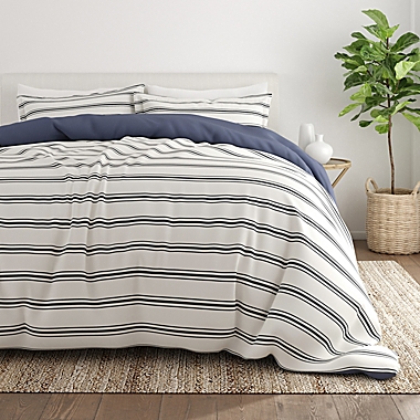 Home Collection Desert Stripe 2-Piece Twin/Twin XL Reversible Duvet Cover Set in Navy. View a larger version of this product image.