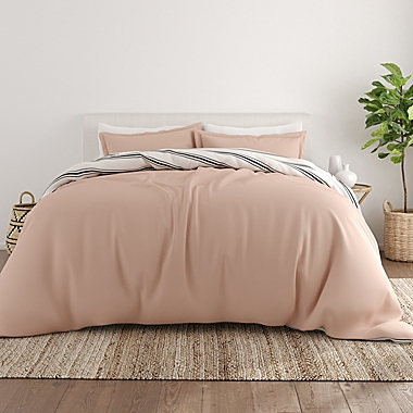 Home Collection Desert Stripe 2-Piece Twin/Twin XL Reversible Duvet Cover Set in Rose. View a larger version of this product image.