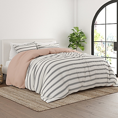 Home Collection Desert Stripe 2-Piece Twin/Twin XL Reversible Duvet Cover Set in Rose. View a larger version of this product image.
