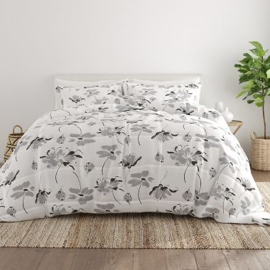 Home Collection Magnolia Print 2-Piece Twin/Twin XL Comforter Set in Grey. View a larger version of this product image.