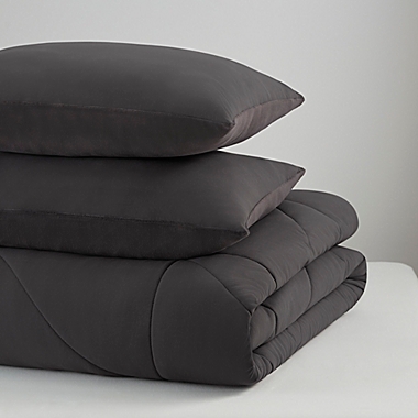 UGG&reg; Corey 3-Piece Reversible Full/Queen Comforter Set in Charcoal. View a larger version of this product image.