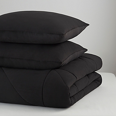 UGG&reg; Corey 3-Piece Reversible Full/Queen Comforter Set in Off Black. View a larger version of this product image.