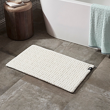 UGG&reg; Iggy 21&quot; x 34&quot; Bath Rug in Snow. View a larger version of this product image.