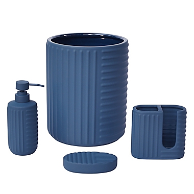 Studio 3B&trade; Rubber Lines Soap Dispenser in Mood Indigo. View a larger version of this product image.