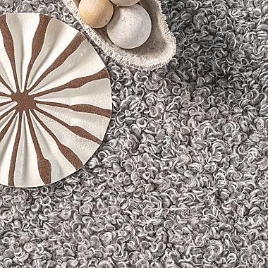 nuLOOM Marlow Machine Washable Soft 5&#39; x 8&#39; Area Rug in Light Grey. View a larger version of this product image.