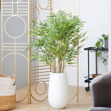 Ridge Road Decor 53.5-Inch Faux Bamboo Plant with White Fiberglass Planter. View a larger version of this product image.