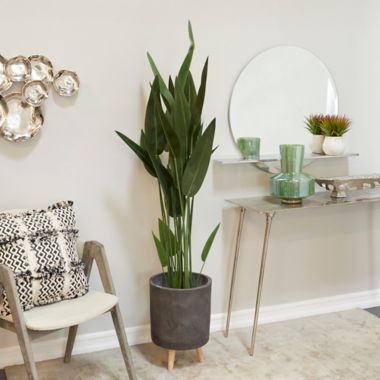 Ridge Road Decor 61-Inch Artificial Banana Leaf Plant with Black Ribbed Planter. View a larger version of this product image.