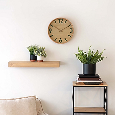 Studio 3B&trade; 12&quot; Round Cutout Dial Wall Clock in Natural Wood. View a larger version of this product image.