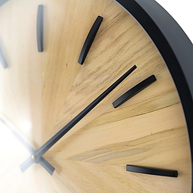 Studio 3B&trade; 26&quot; Round Wood Dial Wall Clock in Black. View a larger version of this product image.