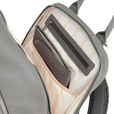 JuJuBe&reg; Million Pockets Faux Leather Deluxe Diaper Backpack in Earth Leather. View a larger version of this product image.