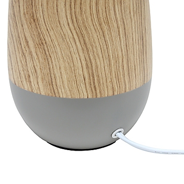 Simple Designs Ceramic Oblong Table Lamp in Natural Wood/Grey. View a larger version of this product image.