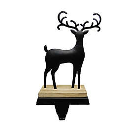 Bee & Willow™ Deer Stocking Hanger with Wooden Base in Black