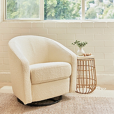 Babyletto Madison Swivel Glider in Ivory Boucle. View a larger version of this product image.