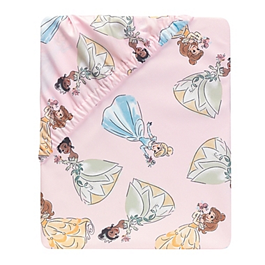 Lambs &amp; Ivy&reg; Disney&reg; Princesses Fitted Crib Sheet in Pink. View a larger version of this product image.