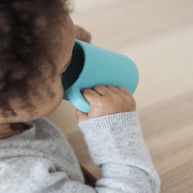 BEABA&reg; 5.8 oz. Silicone Training Cup with Handles. View a larger version of this product image.