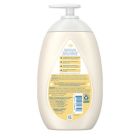 Alternate image 2 for Johnson's 16.9 fl. oz. Skin Nourish Moisturizing Lotion in Shea and Cocoa Butter