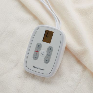 Brookstone&reg; Heated Microfleece Twin Blanket in Cream. View a larger version of this product image.