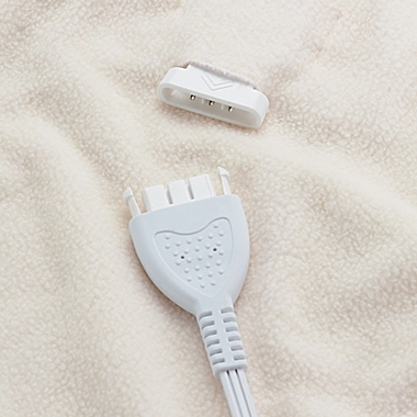 Brookstone&reg; Heated Microfleece Queen Blanket in Cream. View a larger version of this product image.