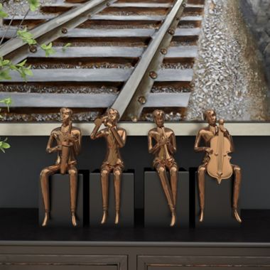 Ridge Road D&eacute;cor 4-Piece Modern Musician Porcelain Sculpture Set in Copper. View a larger version of this product image.
