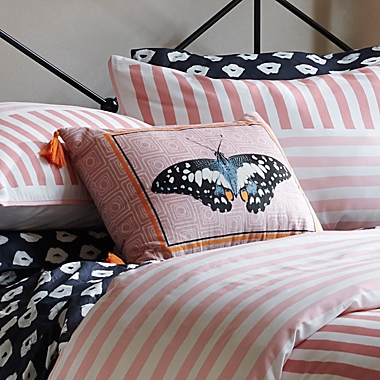 The Novogratz Butterfly Oblong Throw Pillow in Pink. View a larger version of this product image.