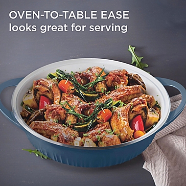 CorningWare&reg; Nonstick 4 qt. Cast Aluminum Covered Braiser in Navy. View a larger version of this product image.