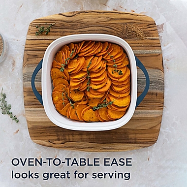 CorningWare&reg; Nonstick 3.2 qt. Cast Aluminum Covered Roaster in Navy. View a larger version of this product image.