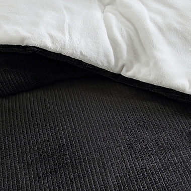 UGG&reg; Brody 4-Piece Reversible Twin/Twin XL Comforter Set in Black/Snow. View a larger version of this product image.
