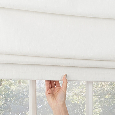 Sun Zero&reg; Somerton Total Blackout 31-Inch x 64-Inch Cordless Roman Shade in White. View a larger version of this product image.