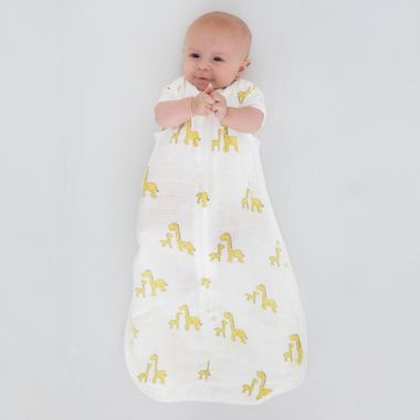 SwaddleDesigns&reg; zzZipMe&reg; Size 6-12M Giraffes Muslin Sleep Sack in Yellow. View a larger version of this product image.