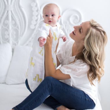 SwaddleDesigns&reg; zzZipMe&reg; Size 6-12M Giraffes Muslin Sleep Sack in Yellow. View a larger version of this product image.