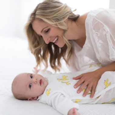 SwaddleDesigns&reg; zzZipMe&reg; Size 6-12M Giraffes Muslin Sleep Sack in Yellow. View a larger version of this product image.