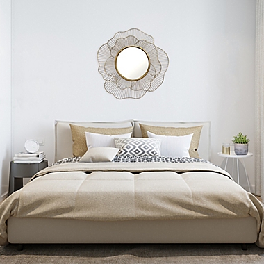 Stratton Home D&eacute;cor 28-Inch Round Stella Wall Mirror in Gold. View a larger version of this product image.