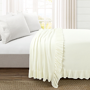 Lush D&eacute;cor Reyna Soft Knitted Ruffle Throw Blanket in Ivory. View a larger version of this product image.