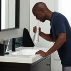 Alternate image 3 for Waterpik&reg; Cordless Plus Waterflosser&reg; in White