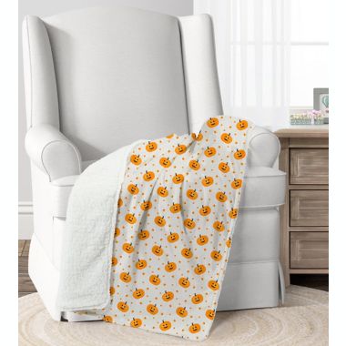 Lush D&eacute;cor Candy Corn &amp; Pumpkins Sherpa Baby Blanket in White. View a larger version of this product image.