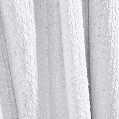 Jasper Haus Galettes Textured Throw Blanket in White. View a larger version of this product image.