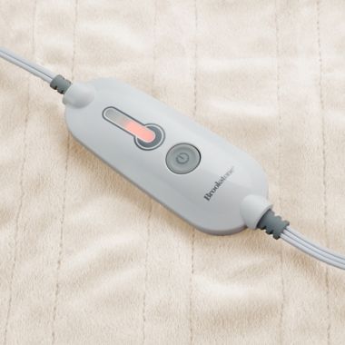 Brookstone&reg; n-a-p&reg; Heated Throw in Cream. View a larger version of this product image.