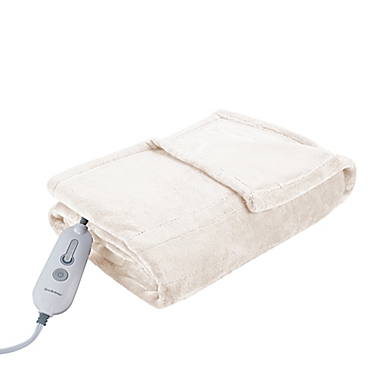Brookstone&reg; N-A-P&reg; Heated Throw in Cream. View a larger version of this product image.