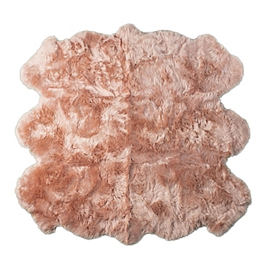 Natural New Zealand Sexto Sheepskin 5&#39; x 6&#39; Area Rug in Pink. View a larger version of this product image.