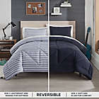 Alternate image 1 for UGG&reg; Corey 2-Piece Reversible Twin/Twin XL Comforter Set in Navy Stripe