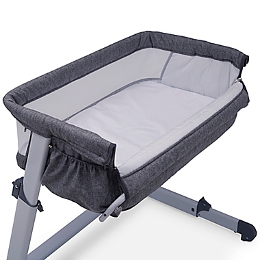 Delta Children Simmons Kids Dream Bedside Baby Bassinet Sleeper in Grey. View a larger version of this product image.