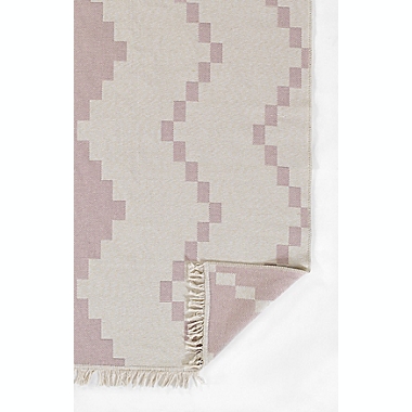 The Novogratz Flex 5&#39;3&quot; x 7&#39; Diamond Reversible Area Rug in Pink. View a larger version of this product image.