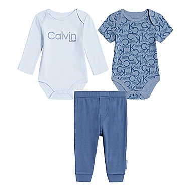 Calvin Klein&reg; Size 6-9M 3-Piece Bodysuit and Pant Set in Blue/Light Blue. View a larger version of this product image.